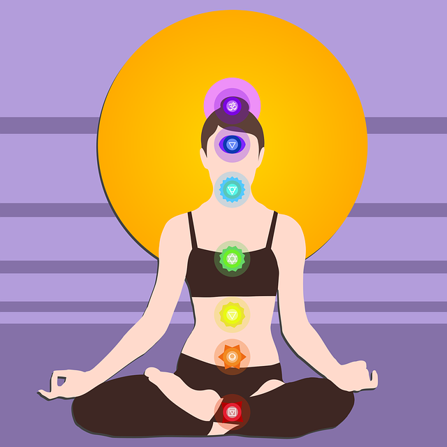 femme en position yogi avec chakras colorés